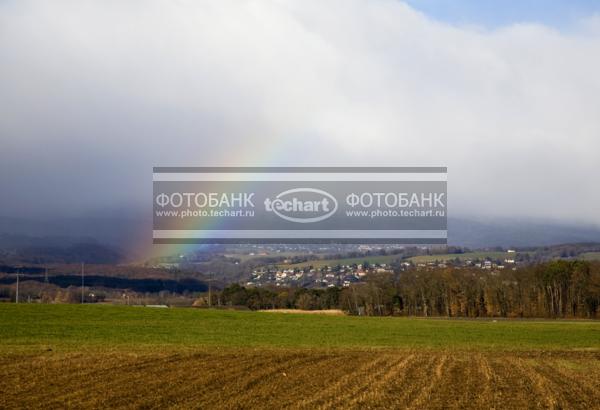 Европа.Швейцария. Радуга над полем / Природа / леса и поля